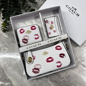 Coach White and Red Lip Print Cosmetic Bag Set